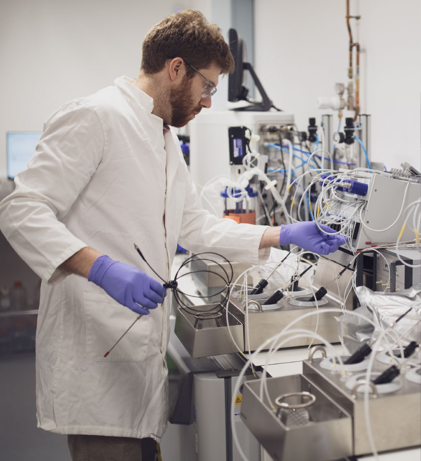 Person using lab equipment